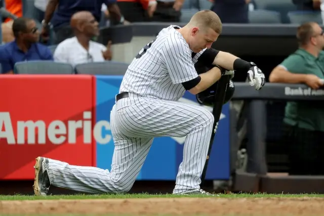 Todd Frazier reacts after a child was hit by a foul ball off his bat in the fifth inning against the Minnesota Twins on September 20, 2017 at Yankee Stadium.